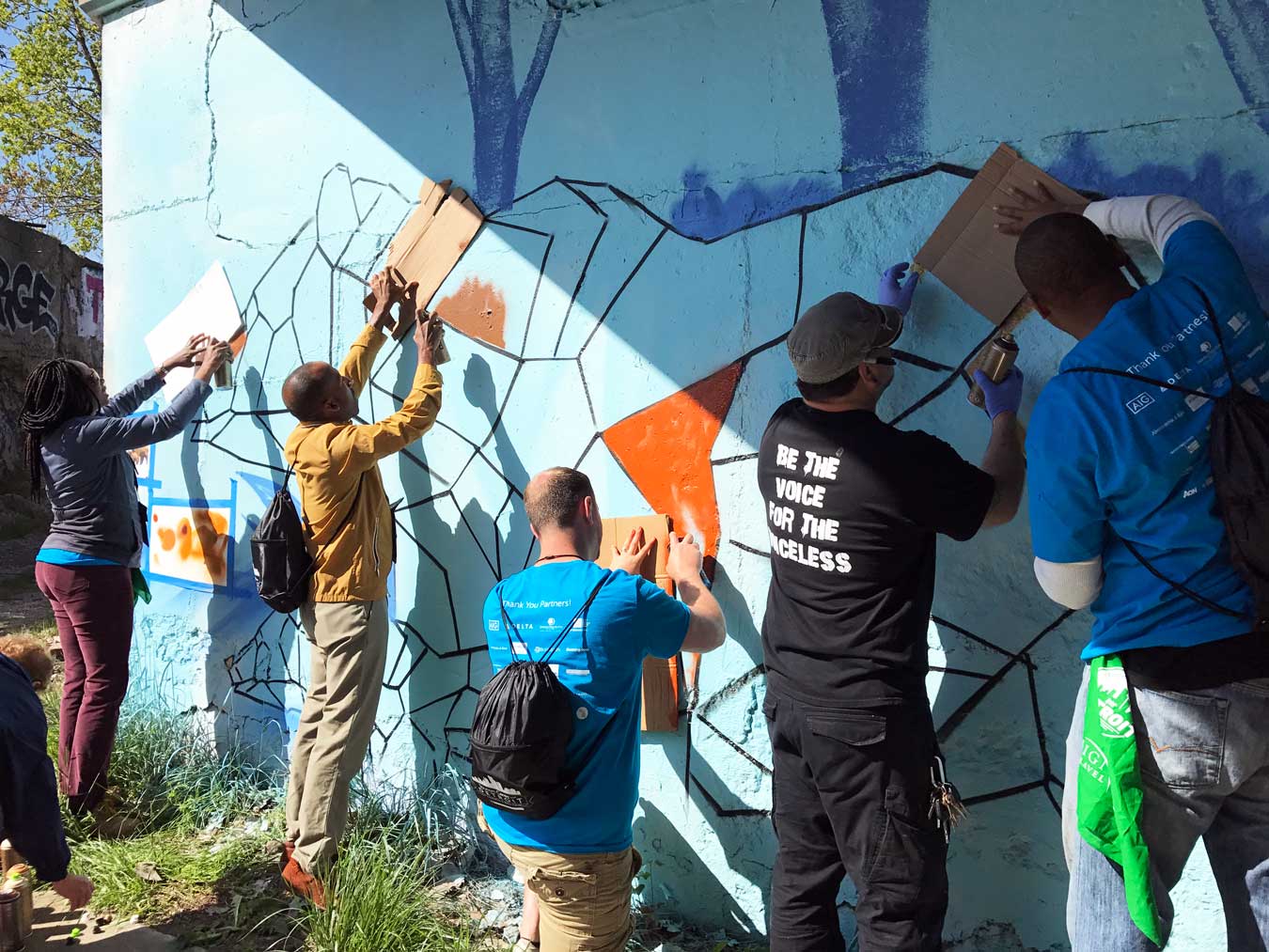 Tourism Cares For Detroit: Graffiti For A Cause (via Wading in Big Shoes) - Graffiti mural in Lincoln Art Park by Fel3000ft and a team of travel & tourism volunteers. Click through to learn more about the mural and revitalization efforts in Detroit!